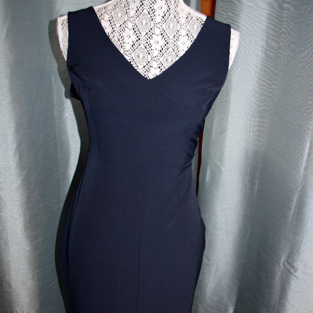 NWT form fitting, V neck midi dress